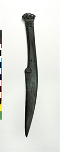 Image of Knife with an Animal in relief attached to the Handle