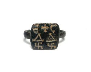 Image of Ring with Letters and Symbols on Bezel